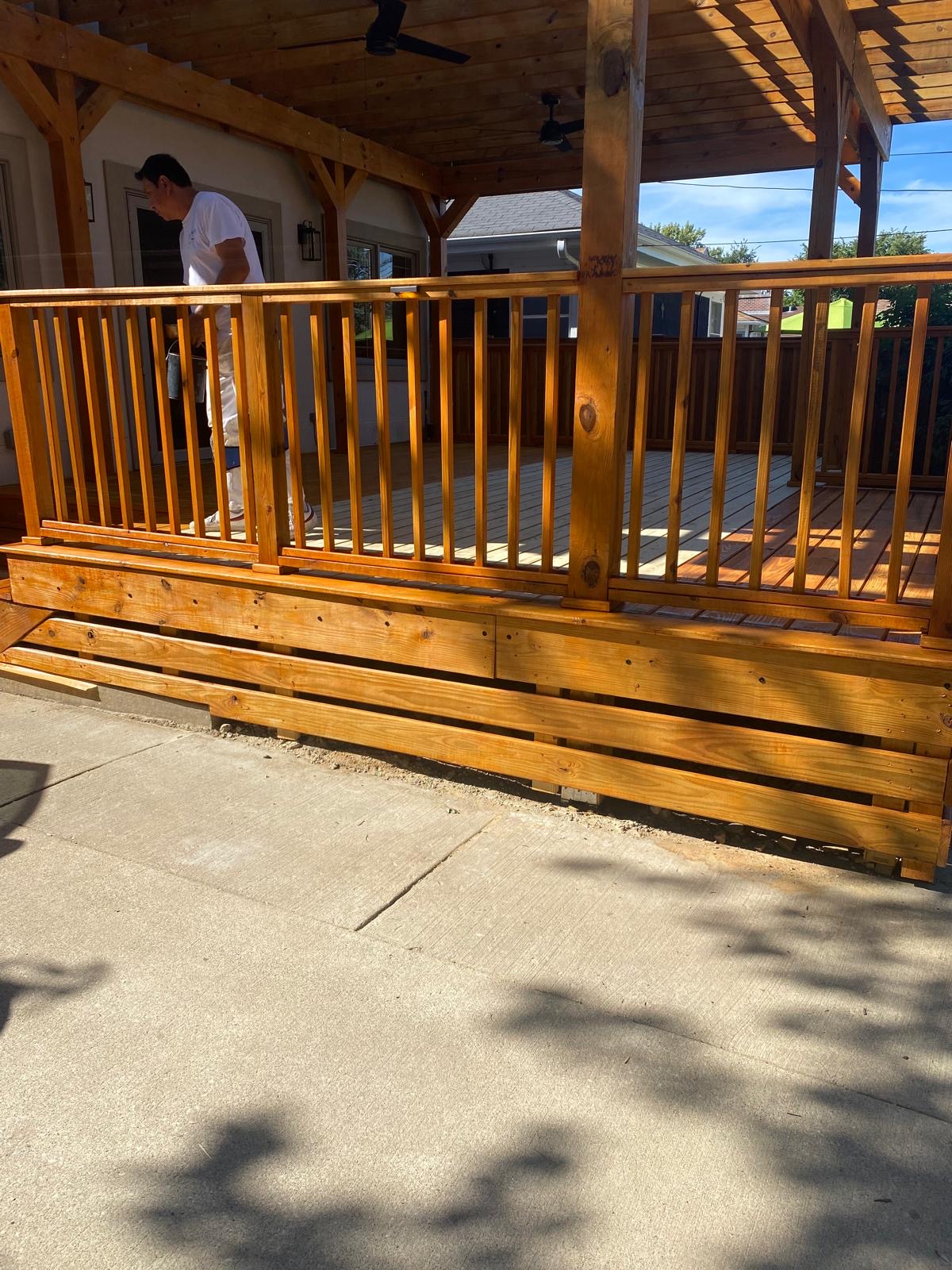 Covered deck with natural wood finish