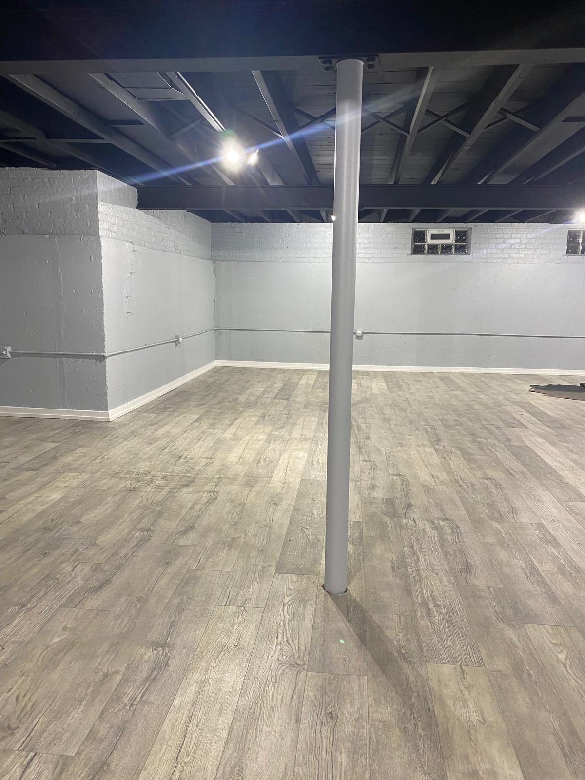 Finished basement with gray walls